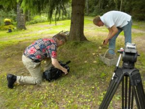 DP Ilmo Lintonen shooting Paavo Turtiainen picking mushrooms in Finland